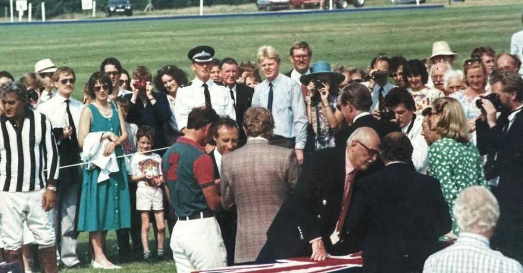 Prince Charles (now King) with Bailiff Bridge residents at the charity polo match in Windsor, 1989—a memorable moment of royal engagement with the community.